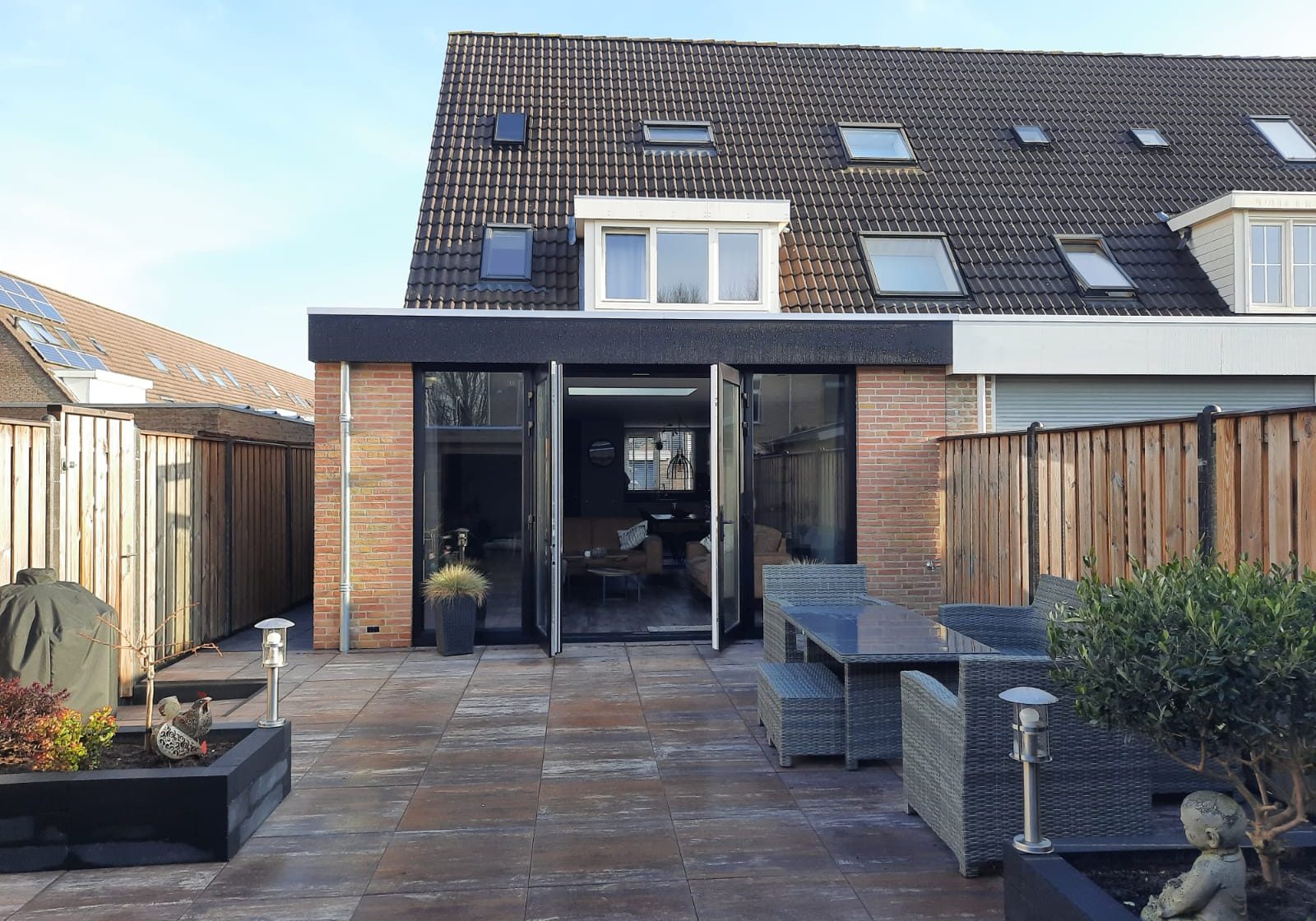 aanbouw laten plaatsen